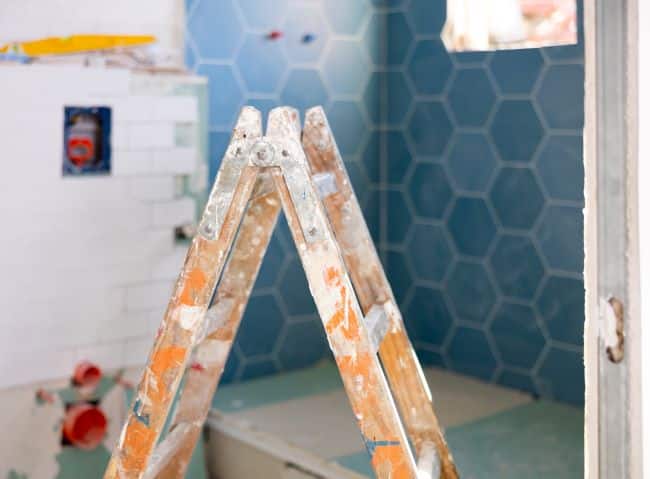 ladder standing in a bathroom during renovations