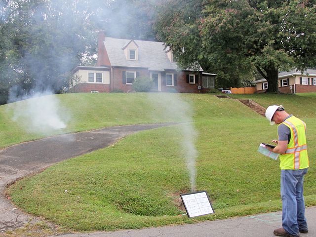 sewer smoke testing front lawn